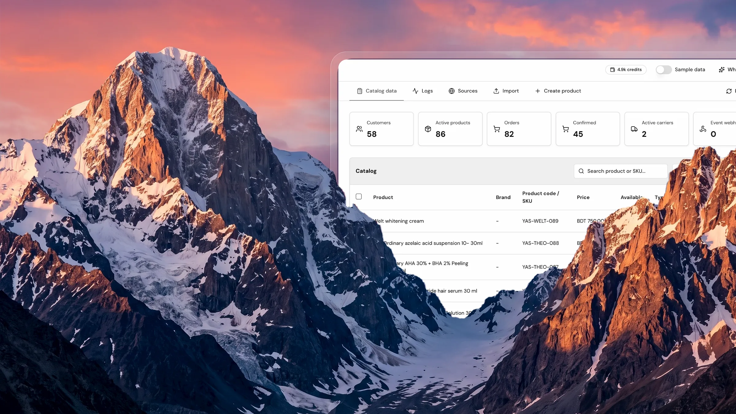Mountain landscape at dawn behind the Omnistra Order OS interface card